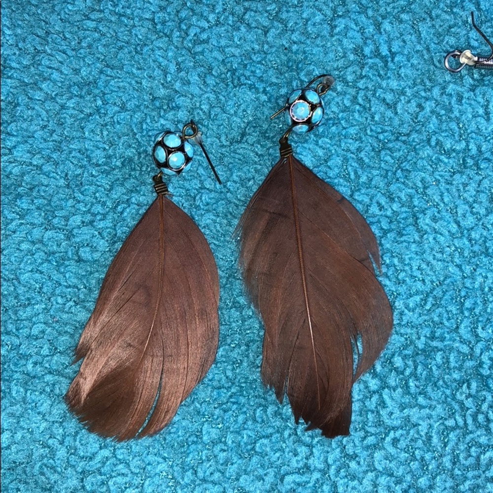 brown feather earings with turquoise beads